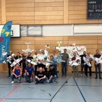 Die Teilnehmer mit den Punktwertern (vorne sitzend)